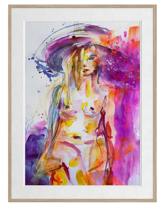 A framed abstract watercolor painting of a nude female figure with a large hat, rendered in vibrant purple, pink, yellow, orange, and blue tones, set in a light wood frame with a white mat.