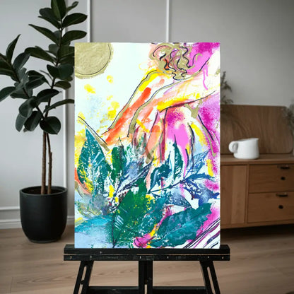 Colorful abstract painting on an easel in a room with a plant and wooden furniture about love.