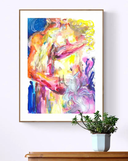 Colorful abstract painting of a couple on a white wall with a plant below.