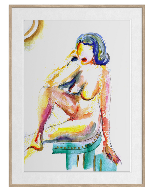 A framed watercolor-style art print depicting a seated nude figure with colorful brushstrokes in blue, yellow, pink, and green on a white background, enclosed in a light wood frame.