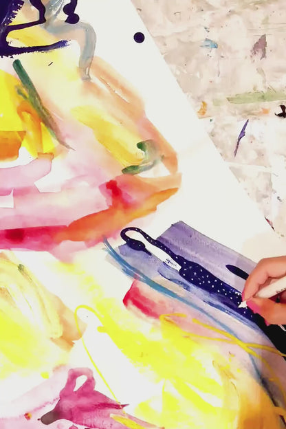 a person is creating a painting of a couple in an abstract style